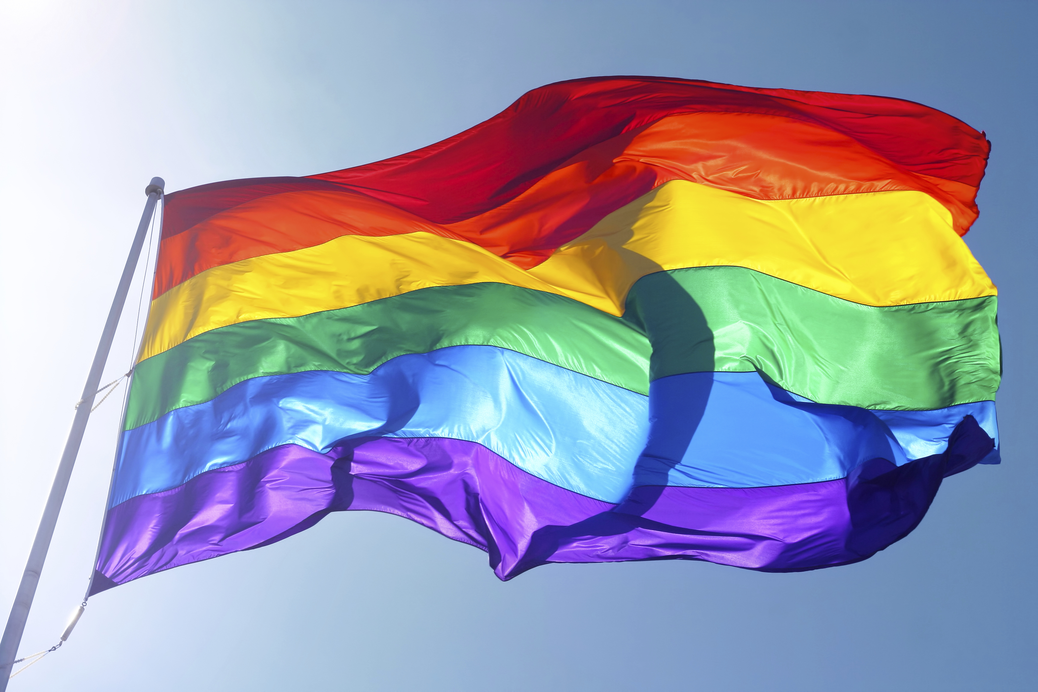 Rainbow Pride flag fluttering in the wind